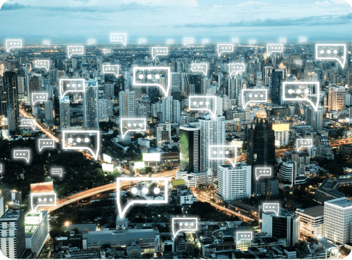 A city skyline at dusk, overlaid with icons representing communication channels and message bubbles.