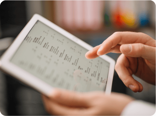 A close-up of a tablet screen displaying patient information and medical data for risk assessment.