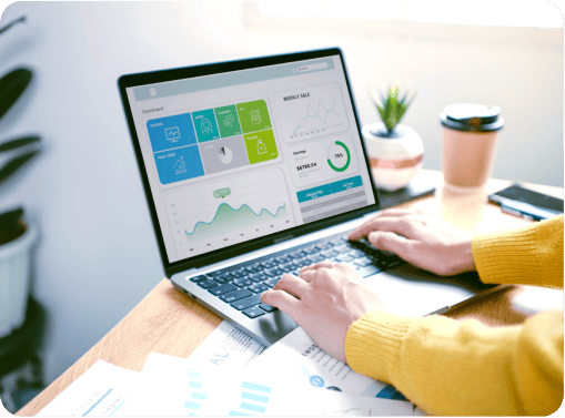 Person viewing detailed analytics and performance reports on a laptop, showcasing data-driven decision-making through reporting tools.